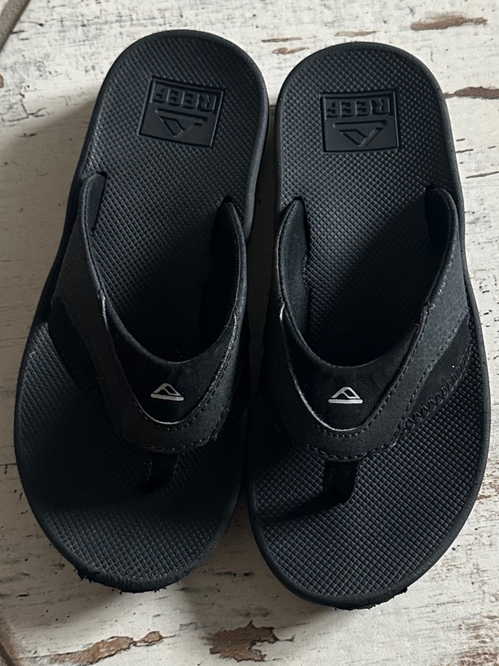 REEF Youth flip flops